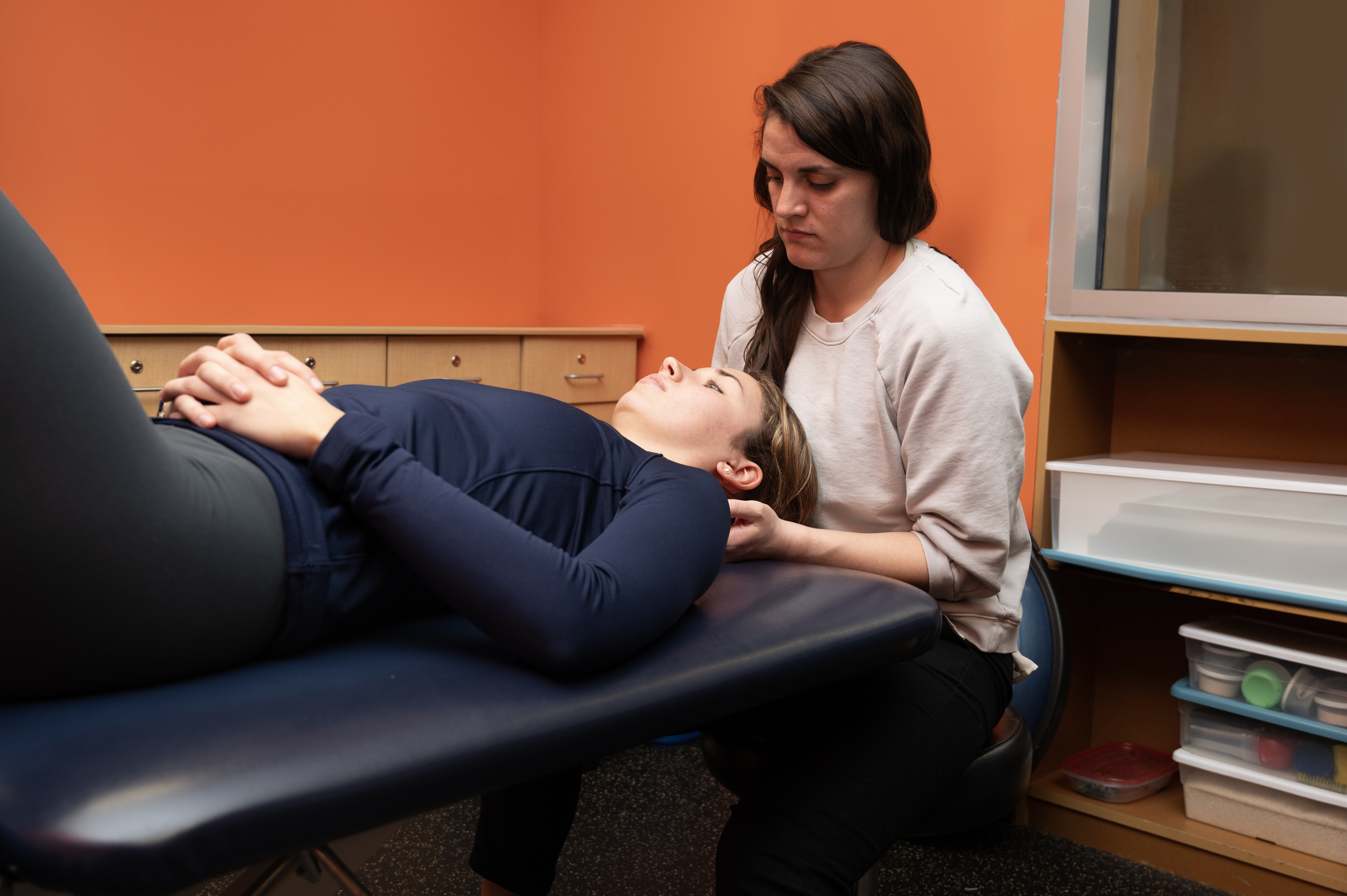 Physical Therapist working on a patient